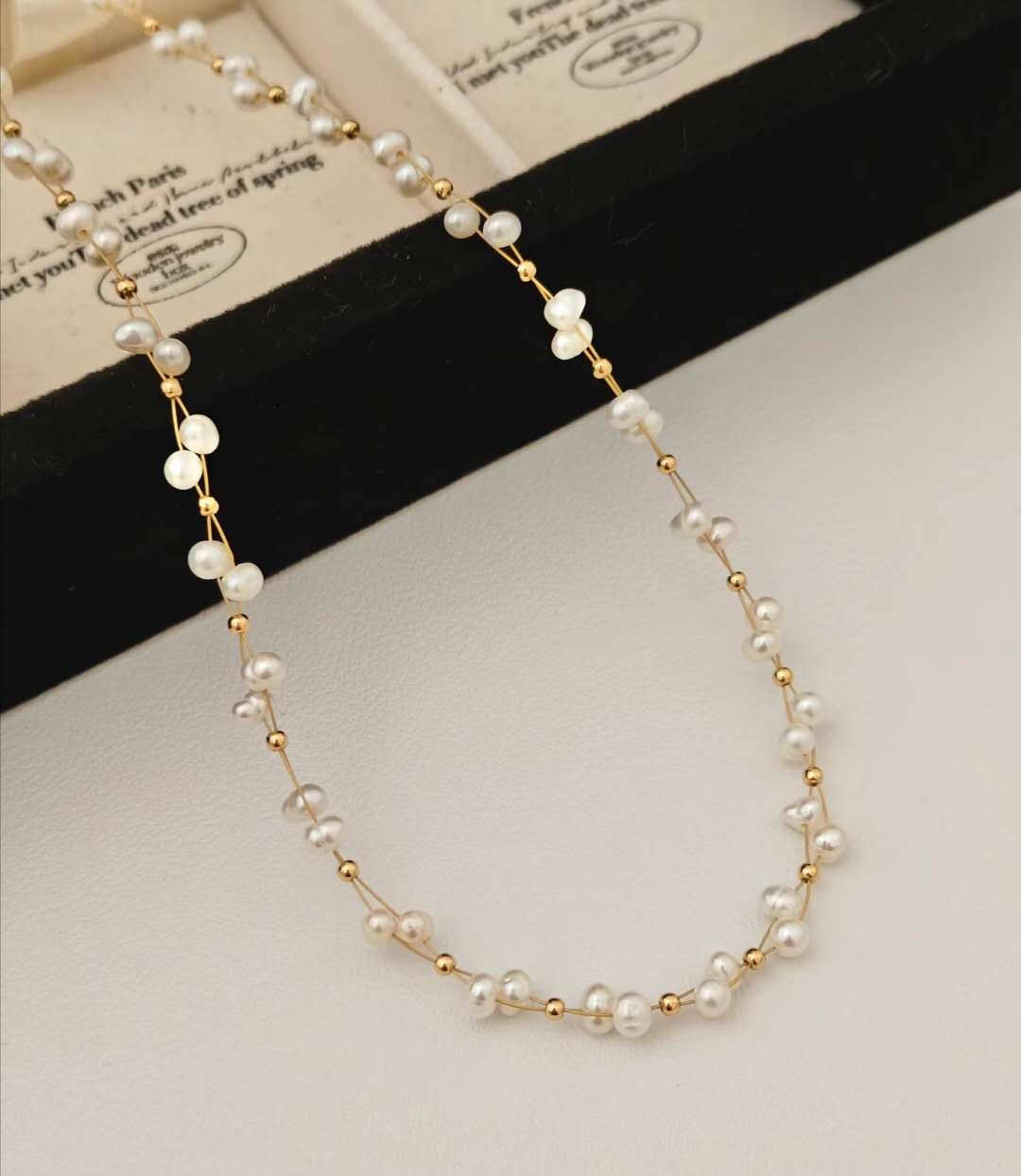 Collar perlita de agua dulce forma trenza plata de ley S925
